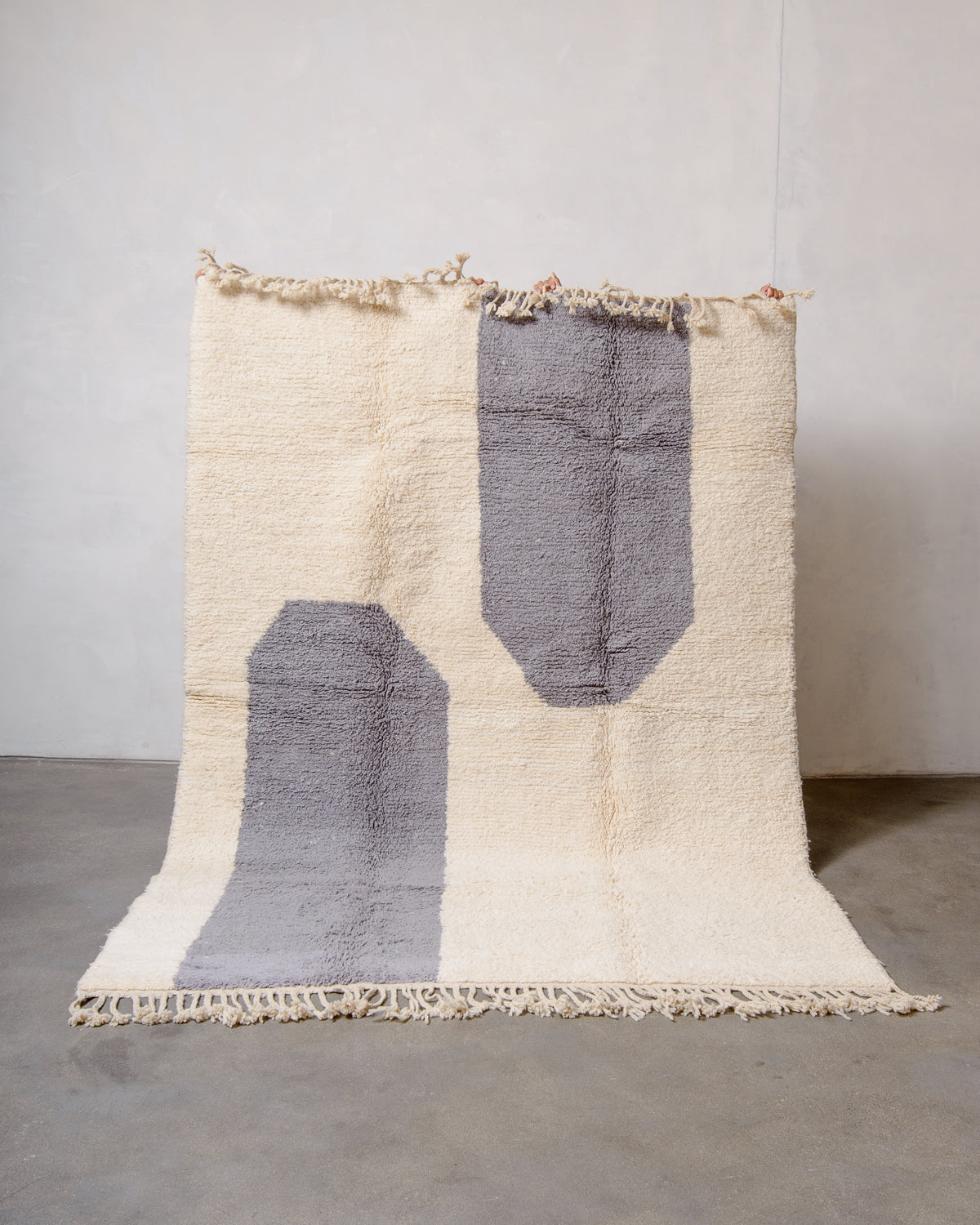Modern, designer, handcrafted Berber rug from Morocco. Beniourain carpet with beautiful colours and patterns and fluffy wool texture.